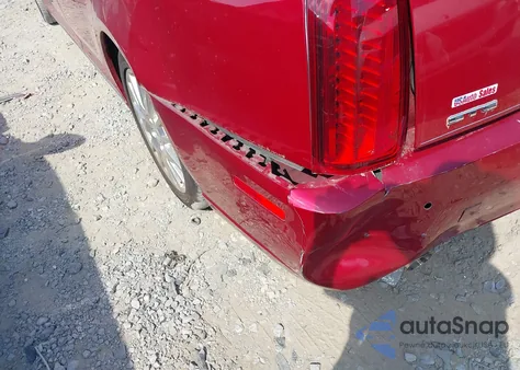 2010 Cadillac Sts Premium Package z USA, uszkodzony, nr VIN 1G6DU6EVXA0106117